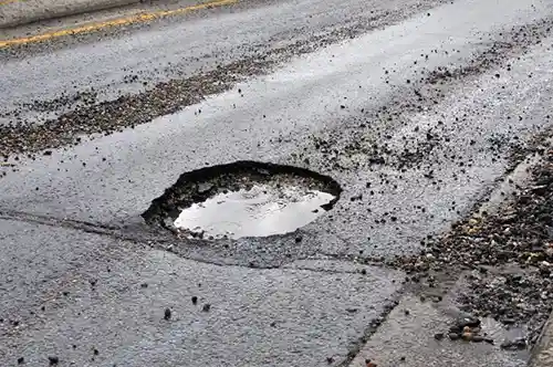 Pothole in asphalt