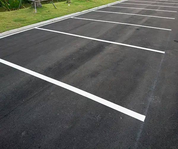 New asphalt parking lot stripes
